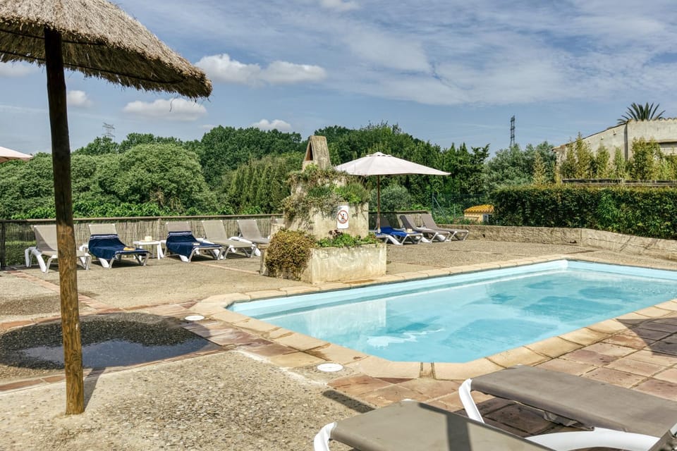 Property building, Living room, Swimming pool