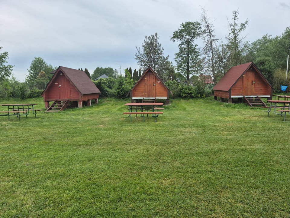 SZAŁASY drewniane nad rzeką BIEBRZA Campground/ 
RV Resort in Poland