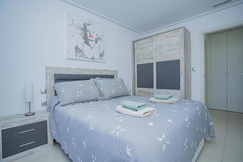 Bed, Bedroom, towels, wardrobe, air conditioner