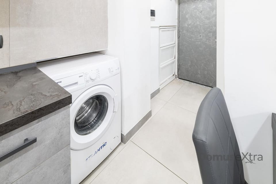 Kitchen or kitchenette, washing machine