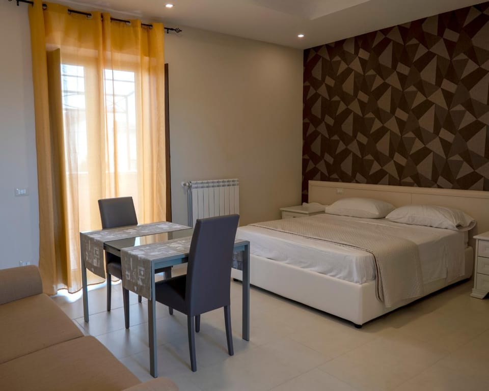 Bed, Seating area, Bedroom