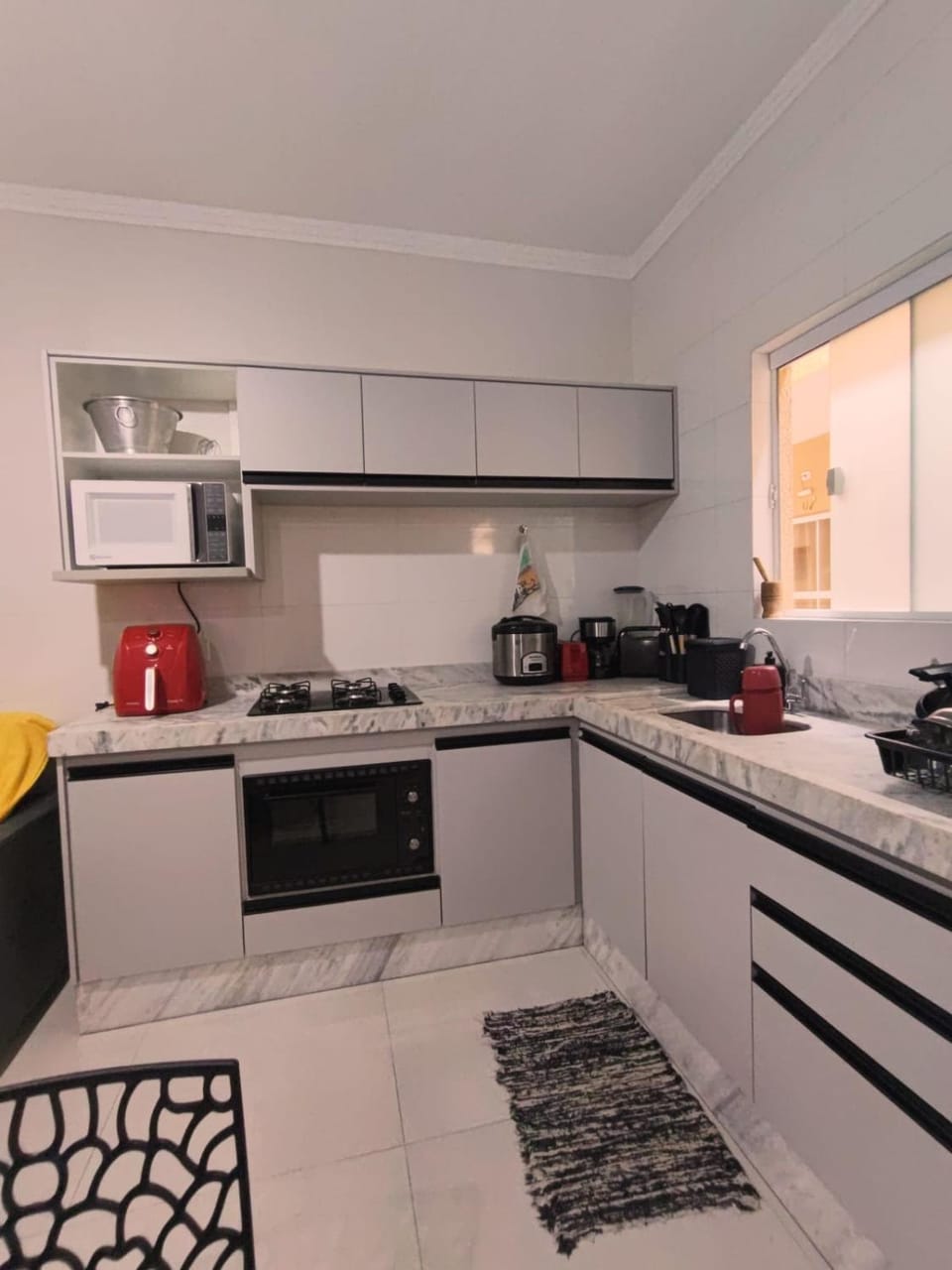 Kitchen or kitchenette, oven, stove, toaster