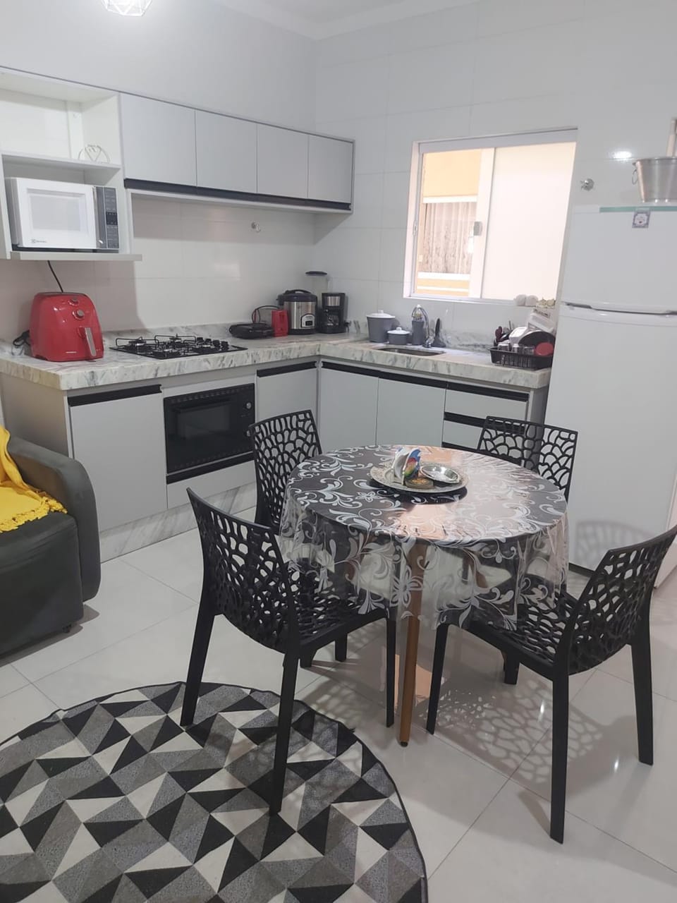 Kitchen or kitchenette, Dining area, microwave, oven, stove, toaster
