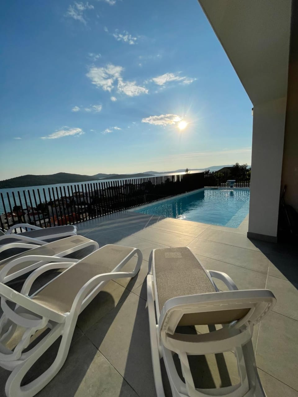 Balcony/Terrace, Pool view, Sea view, Swimming pool, Sunset, sunbed