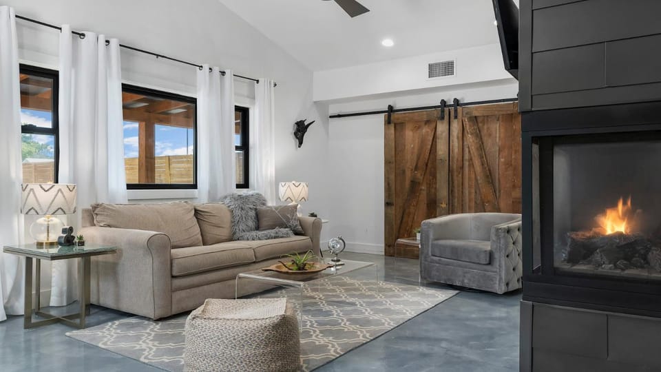 An Enchanted Hideaway outdoor fireplace hot tub House in Fredericksburg