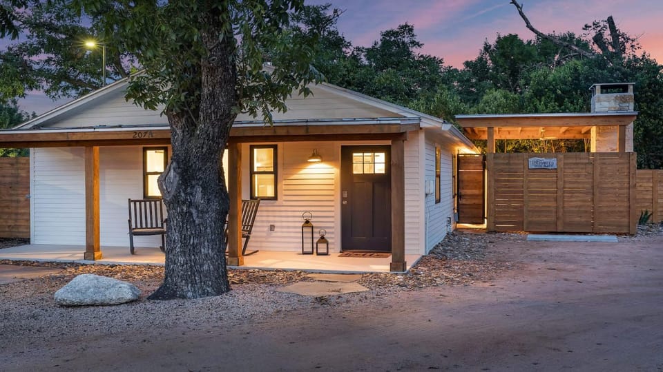 An Enchanted Hideaway outdoor fireplace hot tub House in Fredericksburg