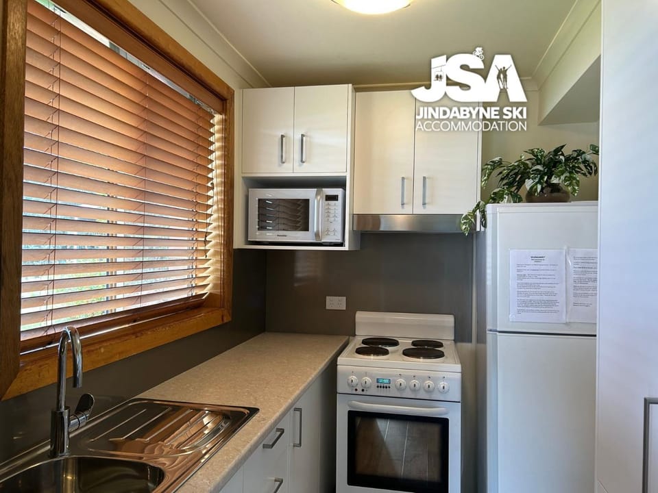 Kitchen or kitchenette, oven, stove