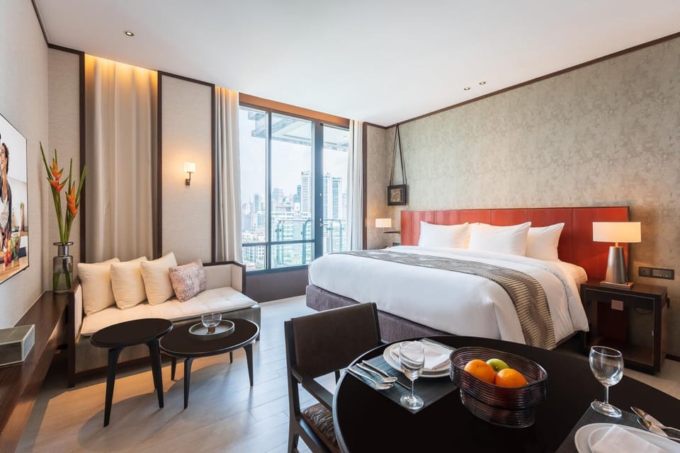 Bed, Seating area, Bedroom, City view