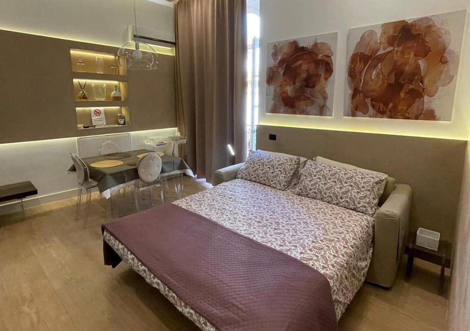 Bed, Living room, Seating area, Bedroom