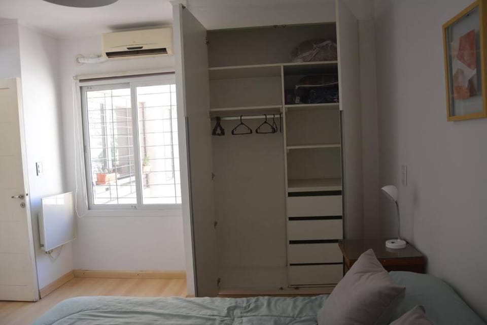 Photo of the whole room, wardrobe, air conditioner