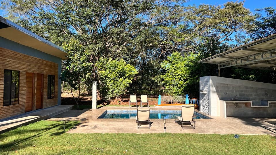 Property building, Patio, Day, Garden, Garden view, Pool view, Swimming pool