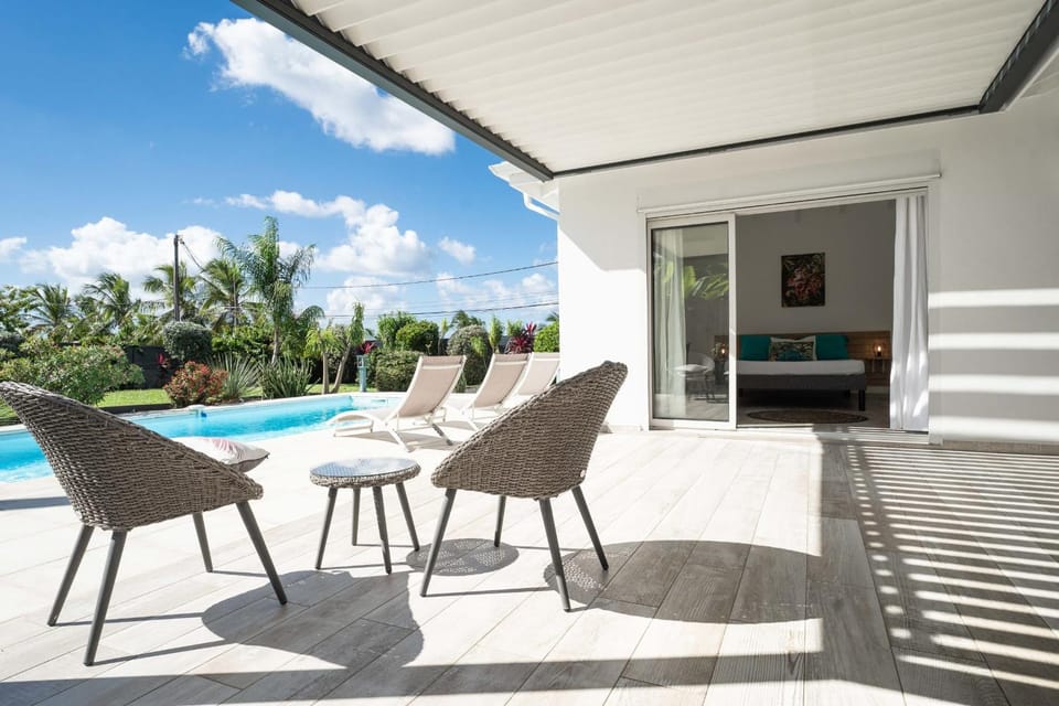 Property building, Patio, Day, View (from property/room), Balcony/Terrace, Living room, Seating area, Pool view, Swimming pool, sunbed