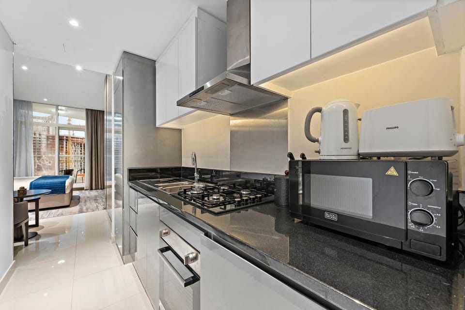 Kitchen or kitchenette, oven, stove, toaster