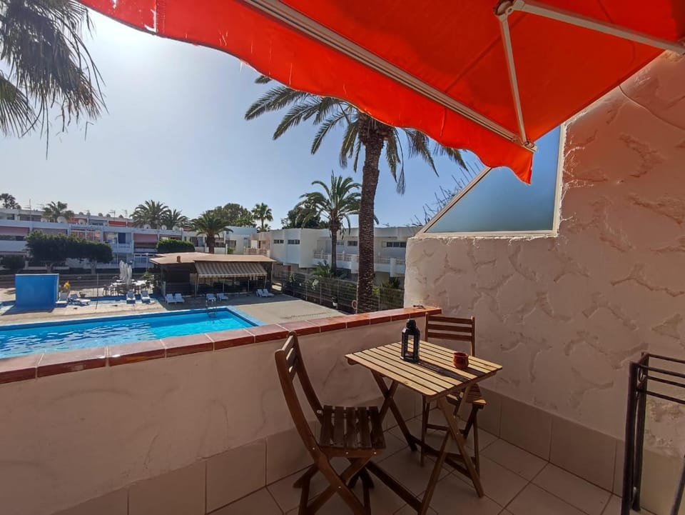 Patio, Pool view, Swimming pool, sunbed