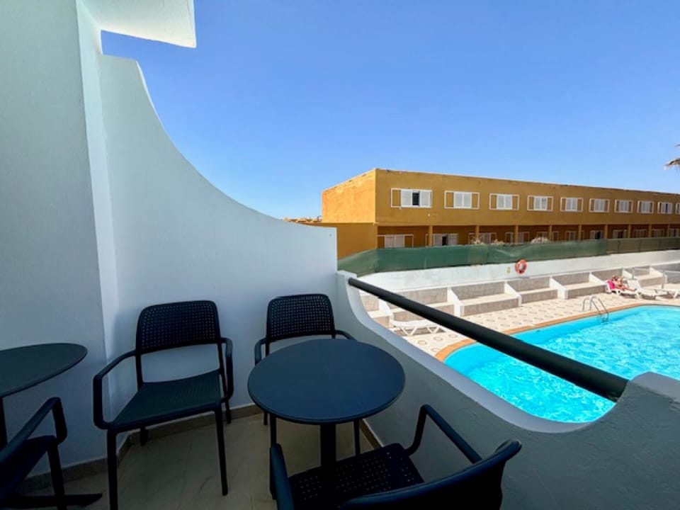 Property building, Living room, Swimming pool