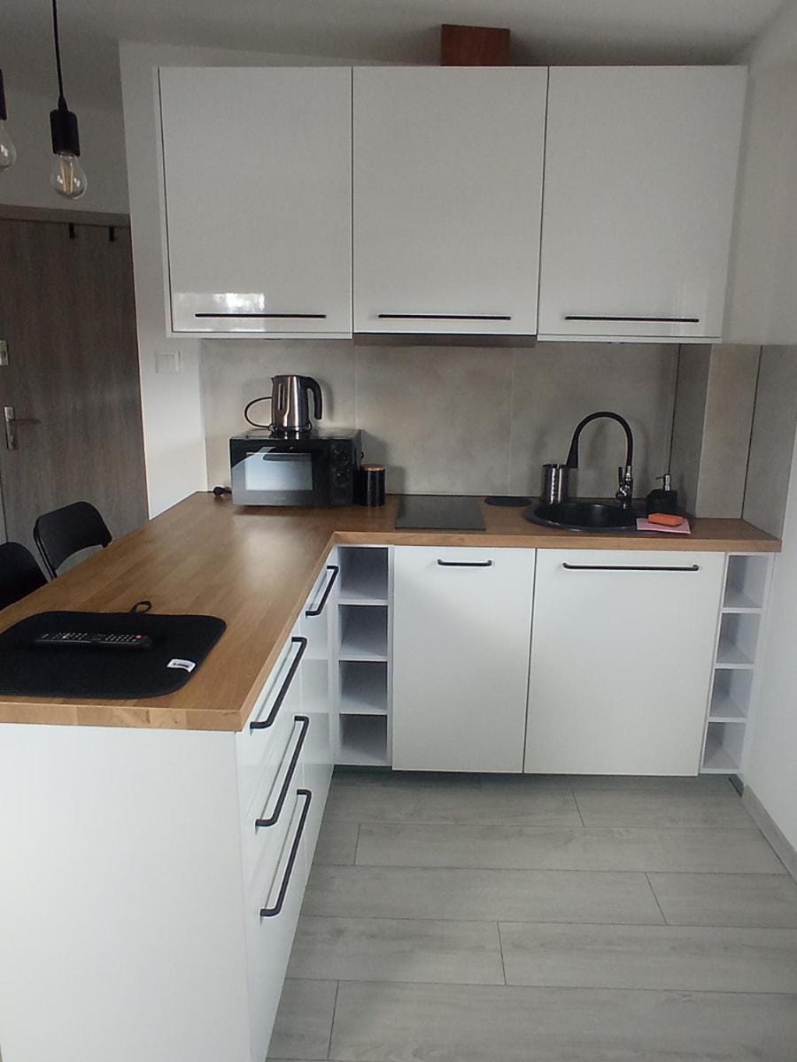 Kitchen or kitchenette, microwave, oven, stove, kitchen