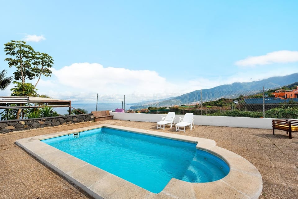 Property building, Living room, Swimming pool