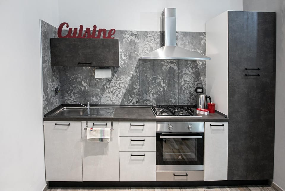 Kitchen or kitchenette, oven, stove