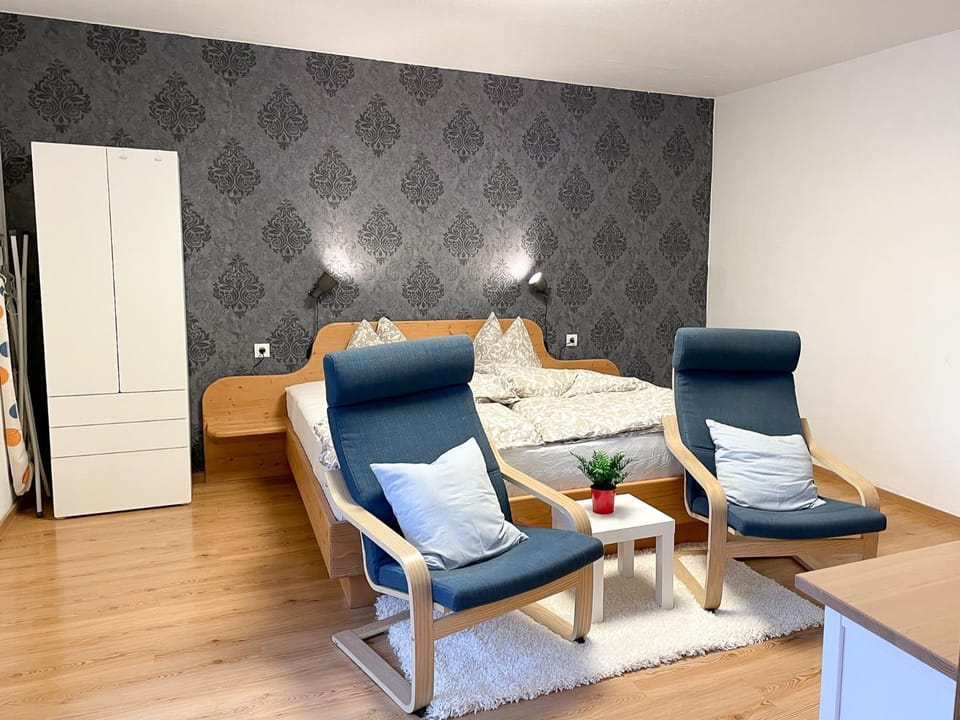 Bed, Seating area, Bedroom, wardrobe