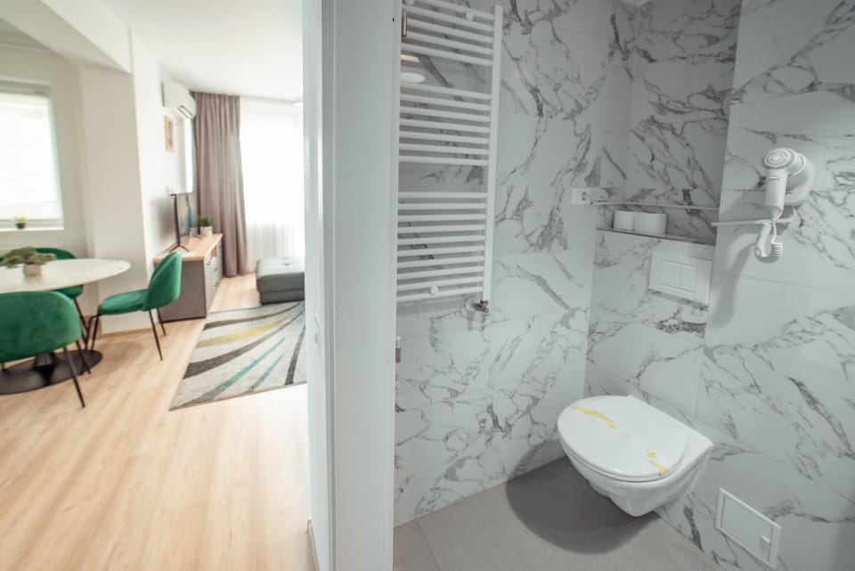 Toilet, Bathroom, Living room, Seating area