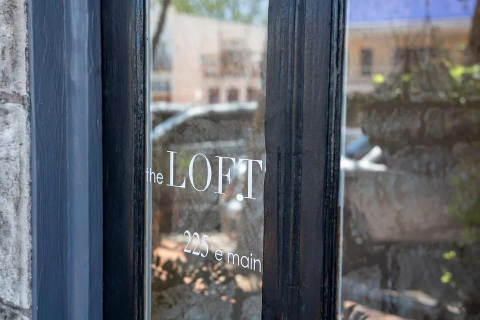 The Loft on Main St loft with balcony views Inn in Fredericksburg