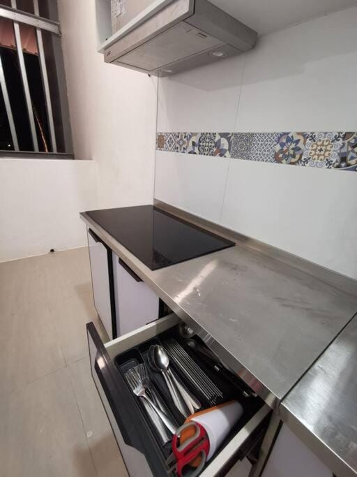 Kitchen or kitchenette, stove