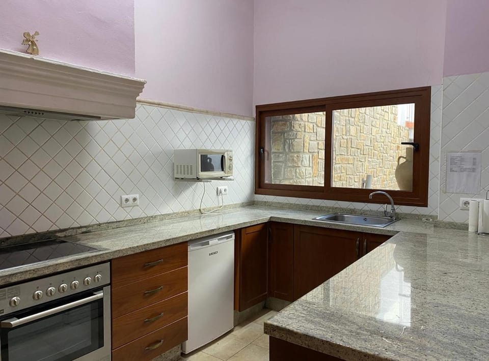 Kitchen or kitchenette, stove, toaster