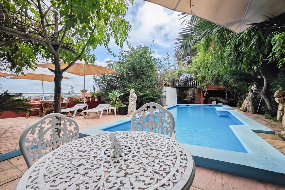 Property building, Living room, Swimming pool