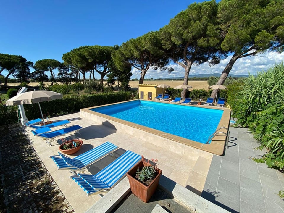 Property building, Living room, Swimming pool