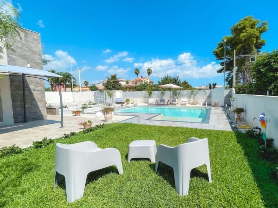 Property building, Living room, Swimming pool