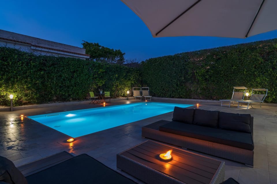 Property building, Living room, Swimming pool
