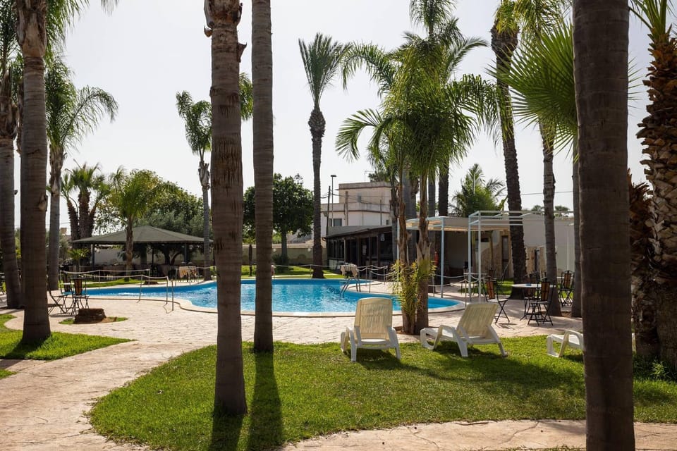 Property building, Living room, Swimming pool