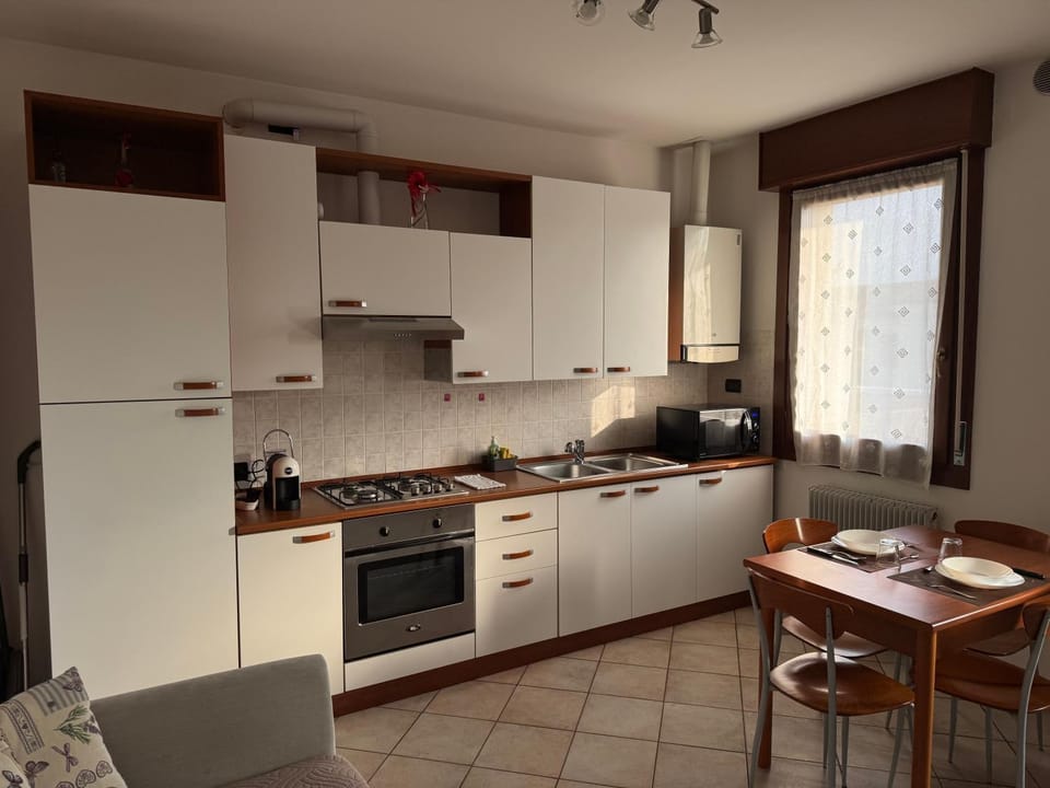 Kitchen or kitchenette, microwave, oven, stove, kitchen