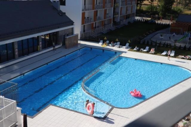 Rest in paradise-baseny,sauna,jacuzzi,silownia,kulkoland i parking gratis!!! SUN RISE festival ul Poleska Apartment in West Pomeranian Voivodeship, Poland