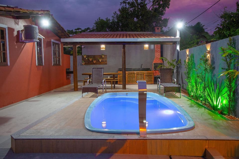 Property building, Patio, Night, Pool view, Swimming pool, sunbed
