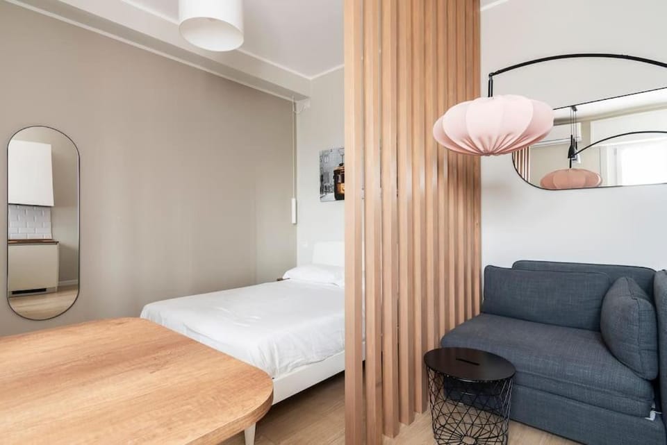 Bed, Living room, Seating area, Bedroom