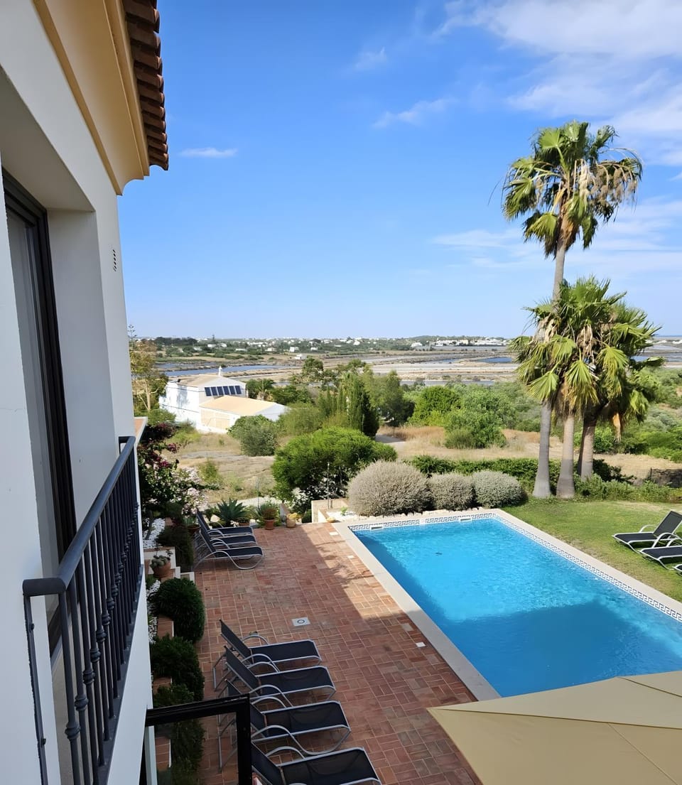 Property building, Living room, Swimming pool