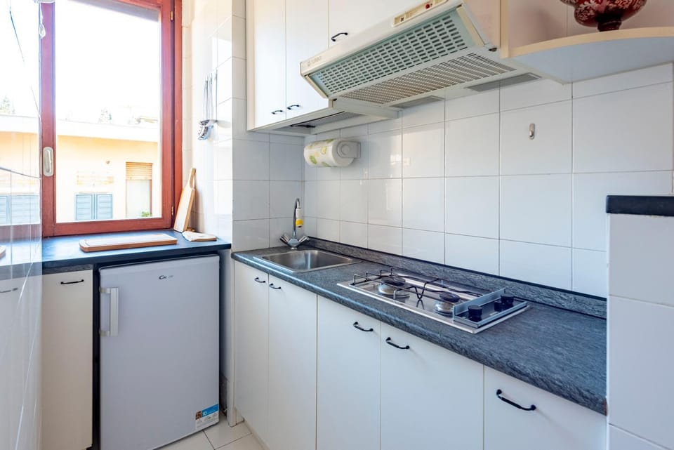 Kitchen or kitchenette, stove