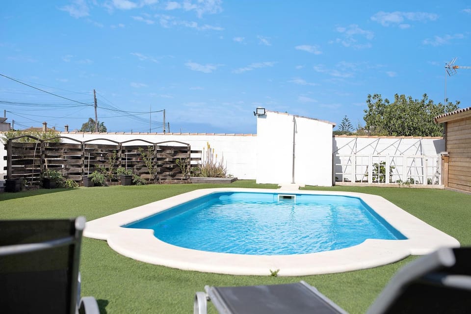 Property building, Living room, Swimming pool
