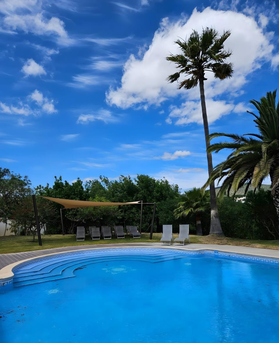 Property building, Living room, Swimming pool