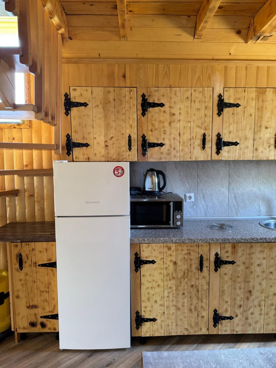 Kitchen or kitchenette, microwave, stove