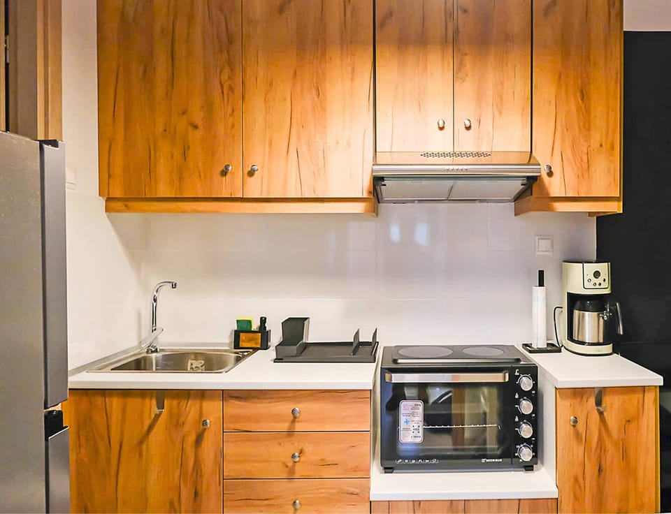 Kitchen or kitchenette, oven