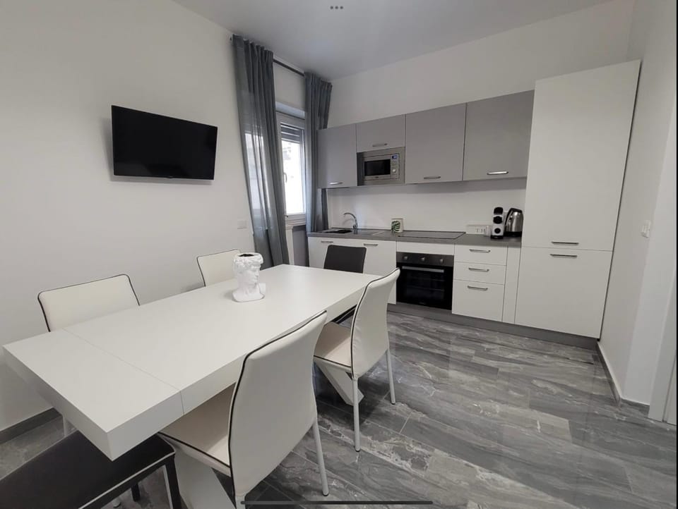Kitchen or kitchenette, Living room, Seating area, stove