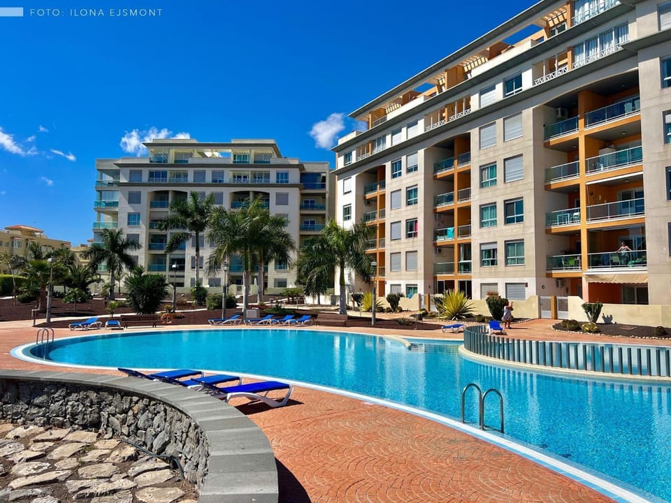 Property building, Living room, Swimming pool