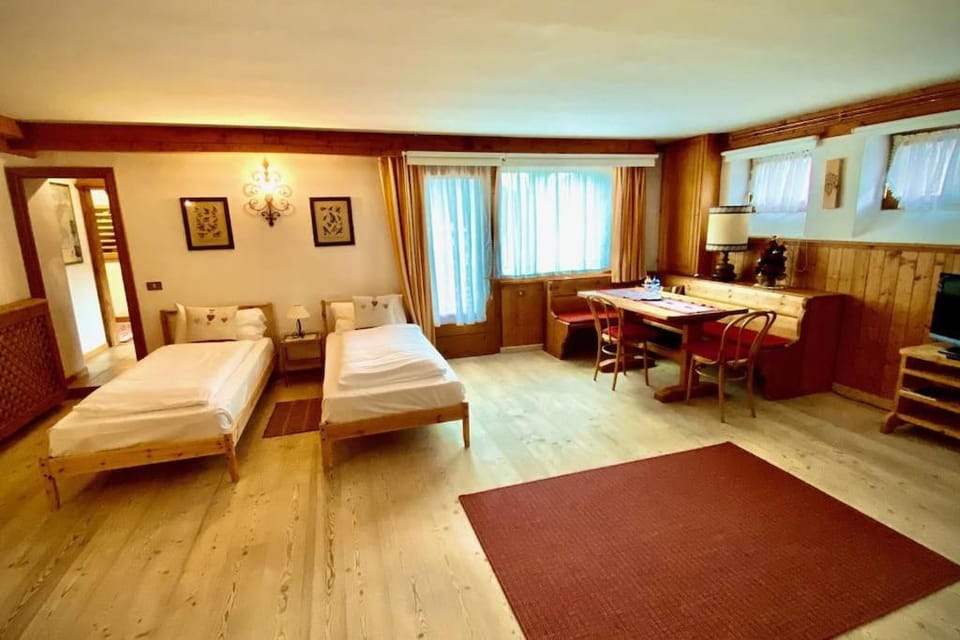 Camera 4 letti +ang cucina/bagno all'interno Villa Apartment in Friuli-Venezia Giulia