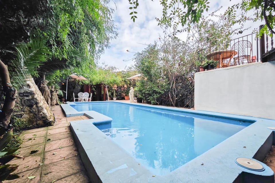 Property building, Living room, Swimming pool