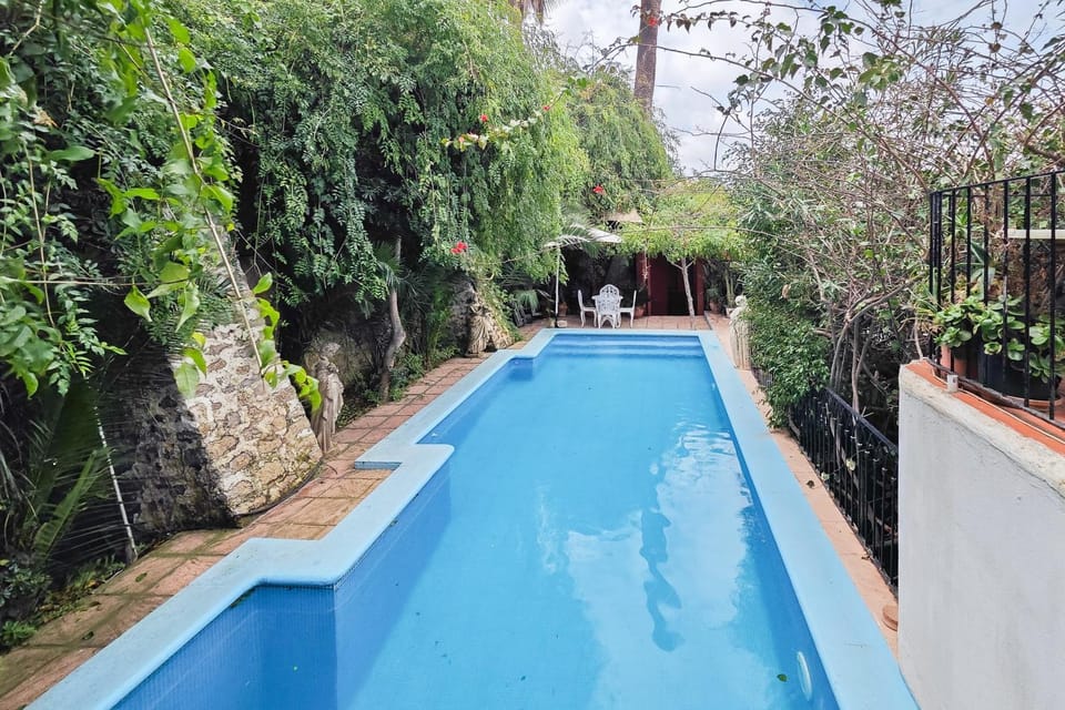 Property building, Living room, Swimming pool