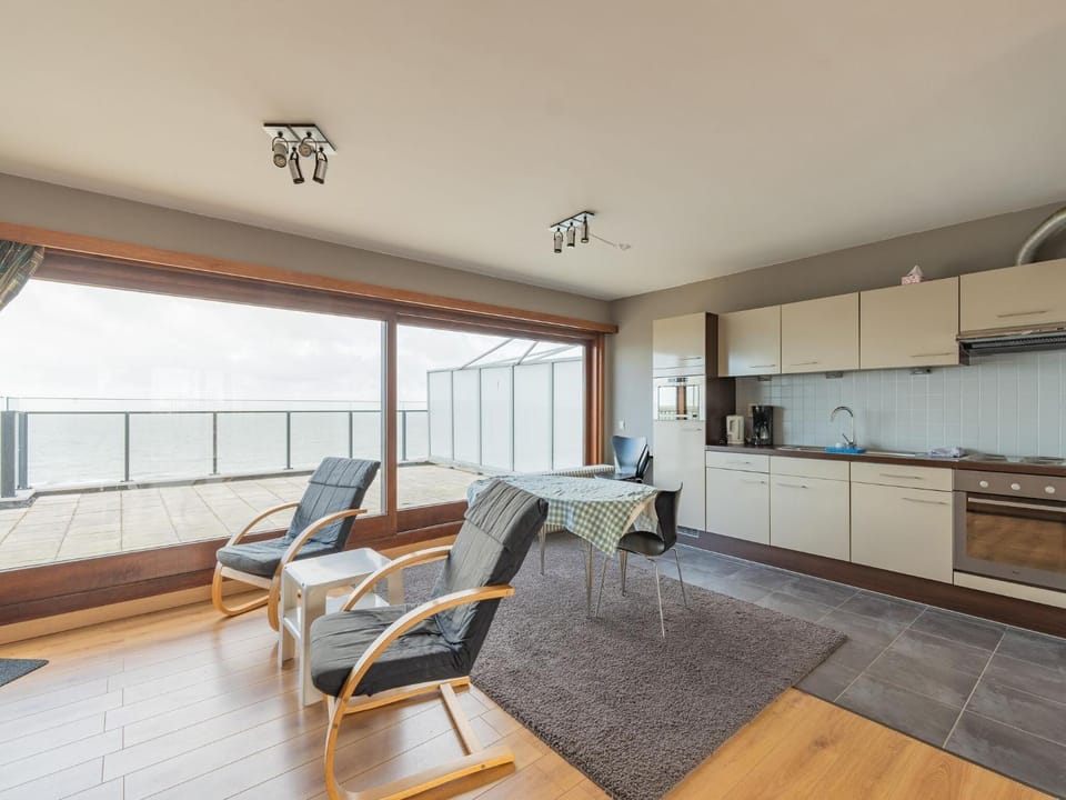 Kitchen or kitchenette, Living room, Seating area, Dining area