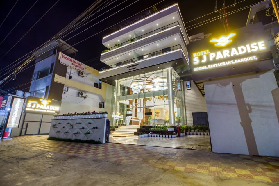 Property building, Facade/entrance, Night, Property logo or sign, Logo/Certificate/Sign