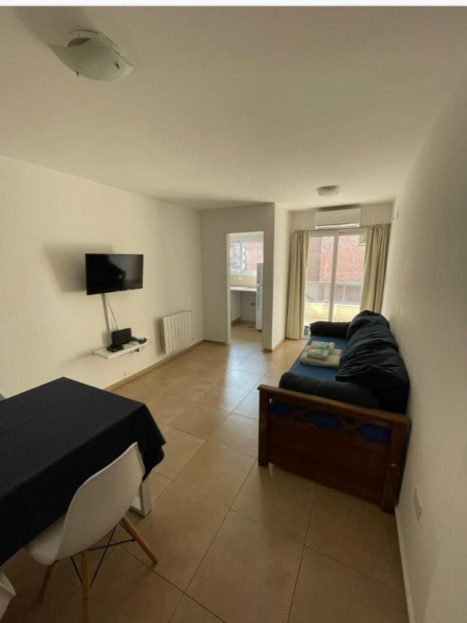 Bed, TV and multimedia, Living room, Photo of the whole room, Seating area, Bedroom